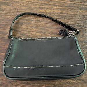 gently used. Small to hold or fits perfectly under your shoulder